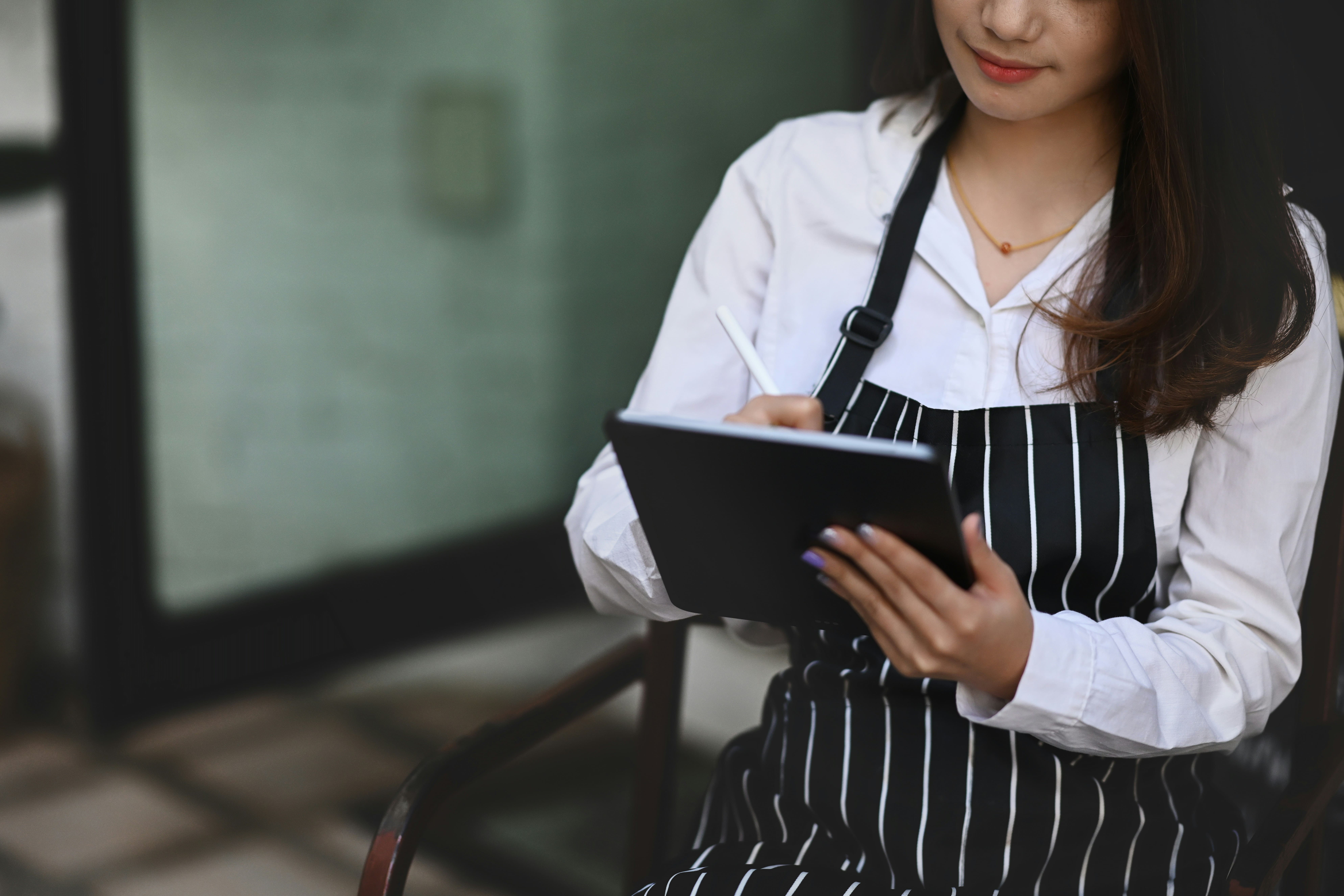 Manager configuring Biova on a tablet
